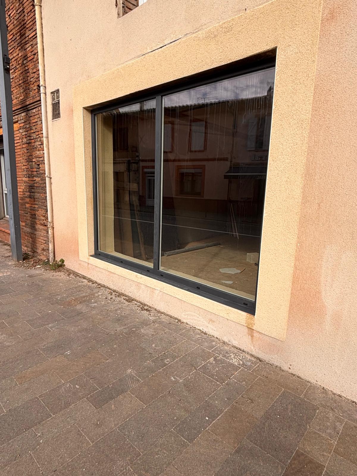 baie vitrée châssis fixe en pvc gris anthracite